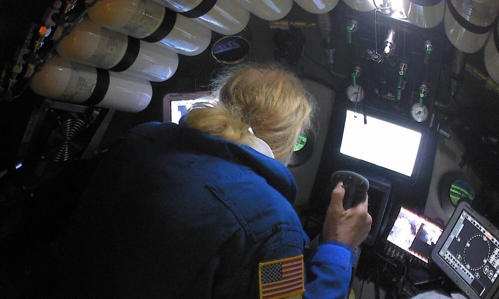 Mr. Victor inside the Triton Full Ocean Depth Submarine
