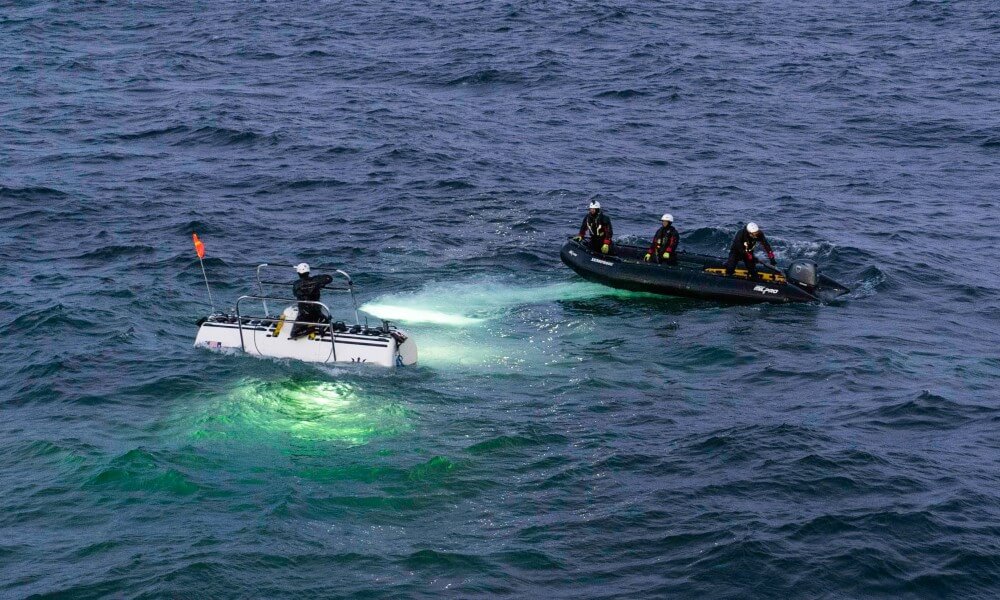 Triton Full Ocean Depth Submarine Diving into the Water
